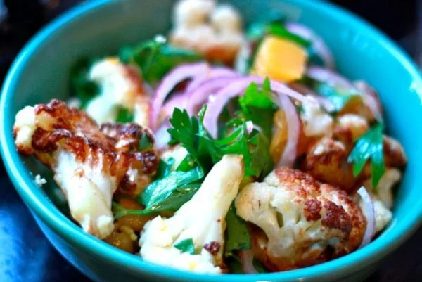 Caramelized Cauliflower with Oranges, Olives and Saffroned Cous Cous