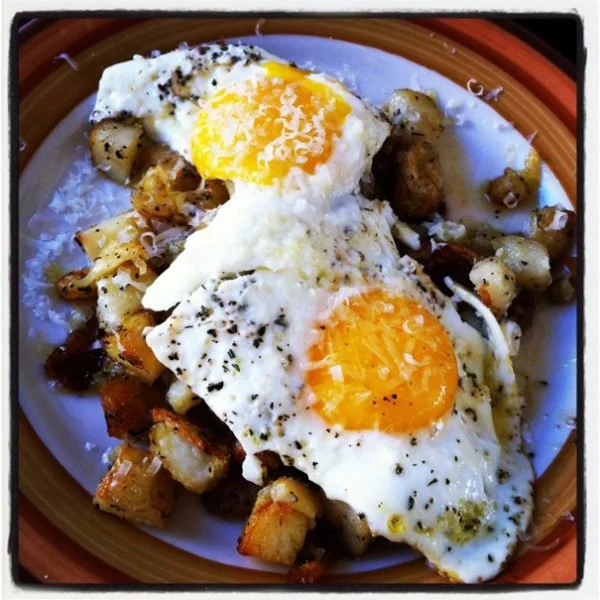Fried Eggs with Roasted Potatoes, Garlic, Rosemary and Pecorino