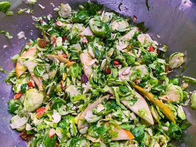 Shaved Brussels Sprout Salad with Pears, Toasted Almonds, and Parmesan