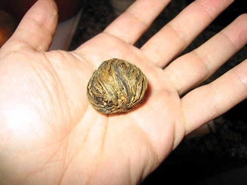 Inside every tea bag is a flower just waiting to bloom.